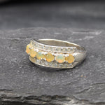 Opal Row Half Eternity Wide Ring in sterling silver featuring natural fire opals with flashes of fire colors, accented by CZ pave for a bold jewelry style. A meaningful October birthstone piece symbolizing balance and inspiration, making it a treasured gift idea. Perfect for weddings, anniversaries, cocktail events, and elegant evening occasions.