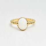 Natural Opal beaded gold ring with a smooth cabochon cut gemstone, offering a minimalist yet elegant style perfect for everyday wear. Opal, the October birthstone, is believed to inspire creativity and emotional balance, making it a meaningful gift for birthdays, anniversaries, weddings, and milestone celebrations.