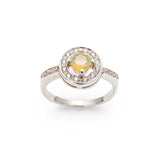 Ethiopian Opal diamond cut halo ring in solid 925 sterling silver, surrounded by sparkling CZ accents for brilliance and elegance. The halo design highlights flashes of fire colors while offering timeless durability. As the October Birthstone, Opal makes a meaningful gift for birthdays, engagements, anniversaries, or personal milestones. Perfect to wear at weddings, cocktail parties, and festive gatherings.