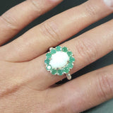 Opal Emerald Halo Ring, October Birthstone worn on the middle finger with bare nails, the floral halo and beaded Bubble Band catching flashes of fire colors, perfect for boosting creativity and calm during brunch dates and daytime outings. Worn for weddings, cocktail parties, anniversaries, graduations, garden events, and holiday gatherings.