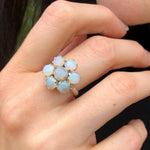 Australian Opal Ring and Pendant in sterling silver paired with minimalist black blouse, perfect for promoting inspiration and creativity, an ideal accessory for dinner dates and birthday celebrations.