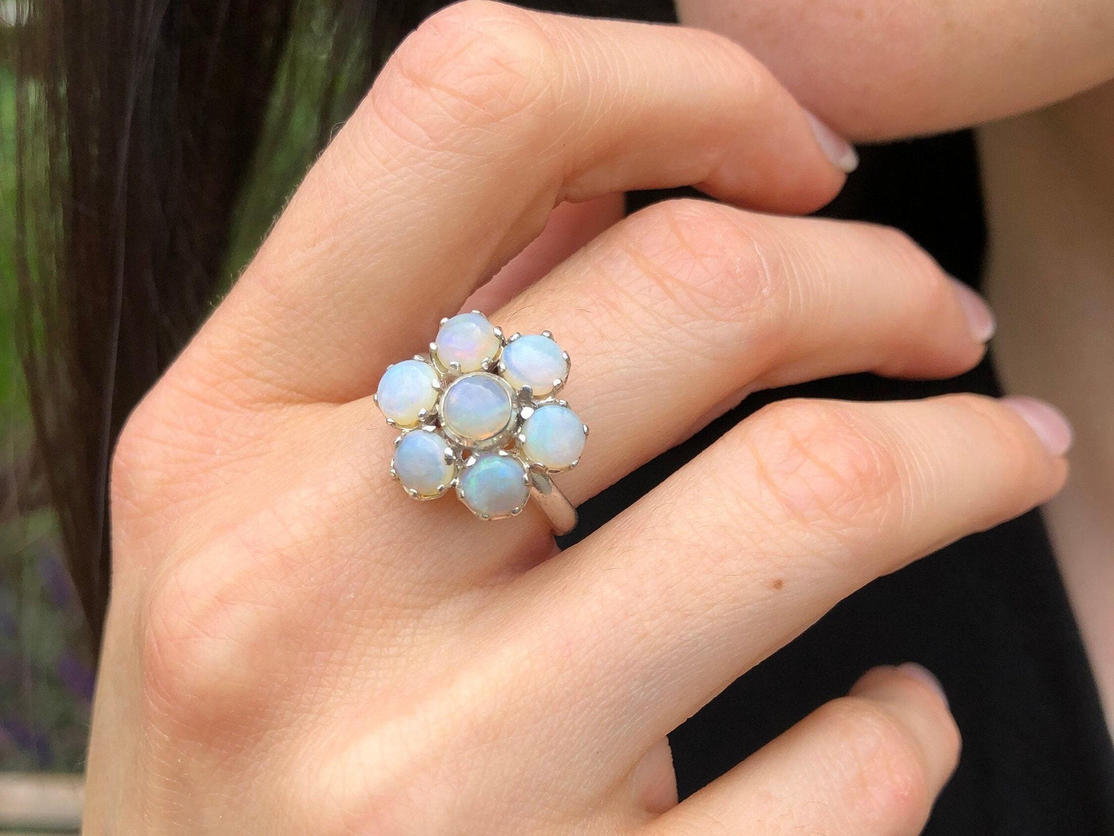 Australian Opal Ring and Pendant in sterling silver paired with minimalist black blouse, perfect for promoting inspiration and creativity, an ideal accessory for dinner dates and birthday celebrations.