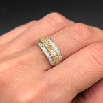 Opal Row Half Eternity Wide Ring worn on index finger with bare nails, its row of opals glowing with flashes of fire colors set between CZ pave bands. A striking October birthstone piece that enhances confidence and elegance, perfect for dinner dates, anniversaries, and celebratory gatherings.