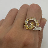 Flower Opal Ring worn on index finger with bare nails, perfect for adding a boho statement and enhancing personal expression, believed to bring joy as an October birthstone gift, ideal for day parties and brunch outings.