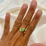 Vintage Opal Ring in a bezel set gold wave design with flashes of rainbow and fire colors, accented by sparkling CZ Diamonds on each curve. Opal is believed to inspire creativity, hope and emotional balance, making it a meaningful October birthstone gift for anniversaries, engagements, weddings and special celebrations.