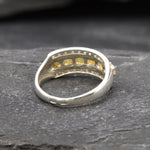 Opal Row Half Eternity Wide Ring in sterling silver featuring natural fire opals with flashes of fire colors, accented by CZ pave for a bold jewelry style. A meaningful October birthstone piece symbolizing balance and inspiration, making it a treasured gift idea. Perfect for weddings, anniversaries, cocktail events, and elegant evening occasions.