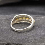 Opal Row Half Eternity Wide Ring in sterling silver featuring natural fire opals with flashes of fire colors, accented by CZ pave for a bold jewelry style. A meaningful October birthstone piece symbolizing balance and inspiration, making it a treasured gift idea. Perfect for weddings, anniversaries, cocktail events, and elegant evening occasions.