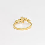 Peridot gold ring with a modern band design, suitable for adding a splash of color and elegance to any look.