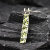 Peridot pendant necklace gift idea, combining natural beauty and symbolic meaning for loved ones.