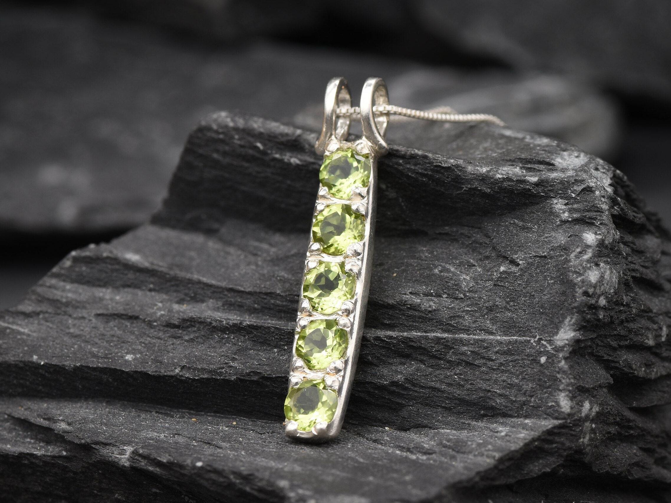 Peridot pendant necklace gift idea, combining natural beauty and symbolic meaning for loved ones.