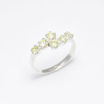 Peridot silver ring designed to bring balance and harmony, crafted with attention to detail and diamond cut clarity.