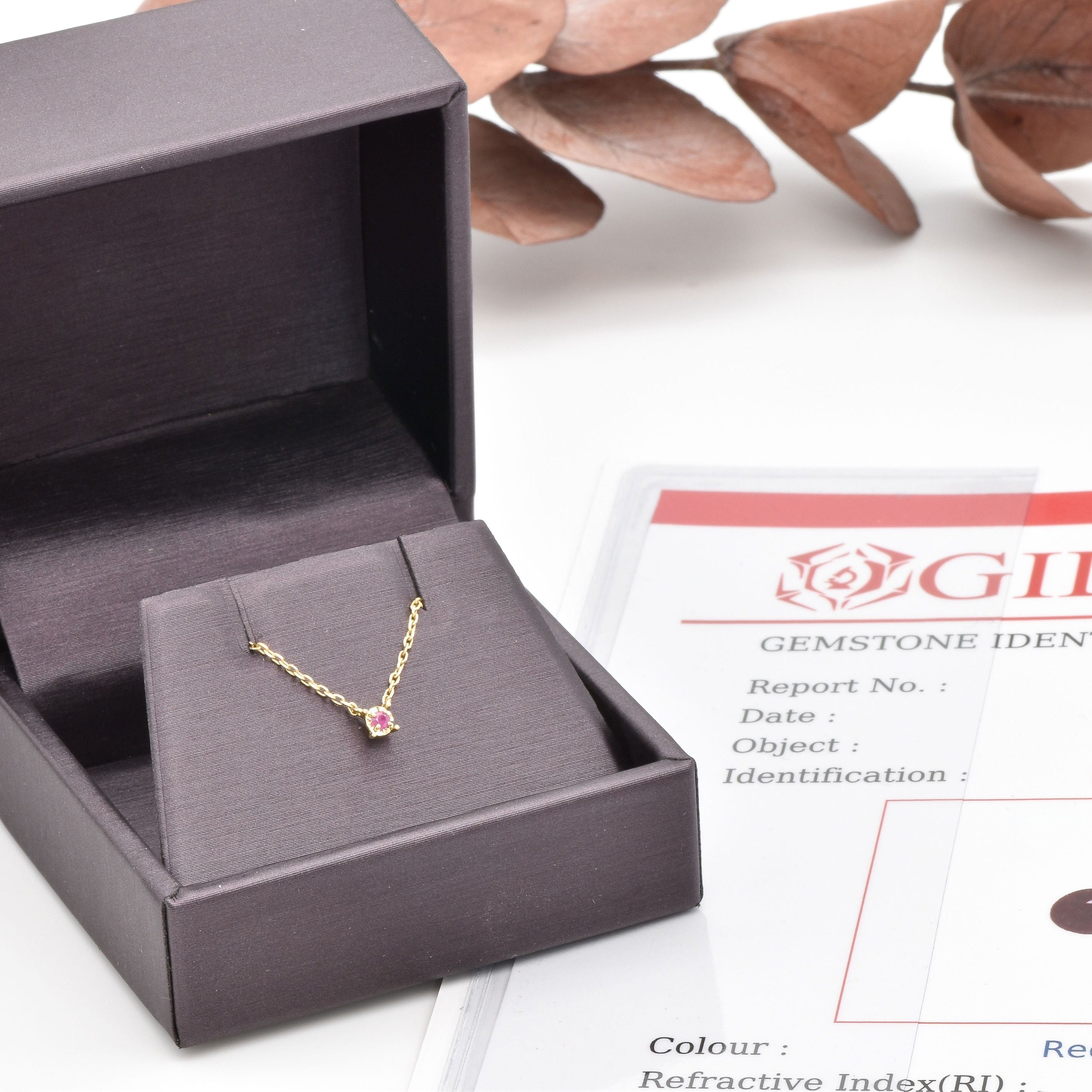 Natural Ruby Solid Gold Necklace in a gift box. A perfect luxury gift idea for her