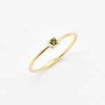 Real Emerald Ring set in Solid 14k Yellow Gold, in a dainty round cut, and natural green color. May birthstone ring that encourages growth, harmony, and deep emotional healing. Minimalist solid gold ring, perfect for everyday wear, and an ideal may birthday gift idea, or anniversary present.