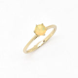 Genuine Fire Opal solitaire ring in 14k solid yellow gold with flashes of fire colors, symbolizing passion and creativity, perfect as an October birthstone engagement, anniversary, or milestone gift.
