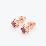 Real Ruby Earrings in Solid Gold Flower Studs. Dainty red ruby earrings ideal for everyday wear, and a perfect July birthday gift idea