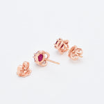 Solid 14k Rose Gold Earrings set with Natural Ruby, in round cut, and prong setting, with natural red color.