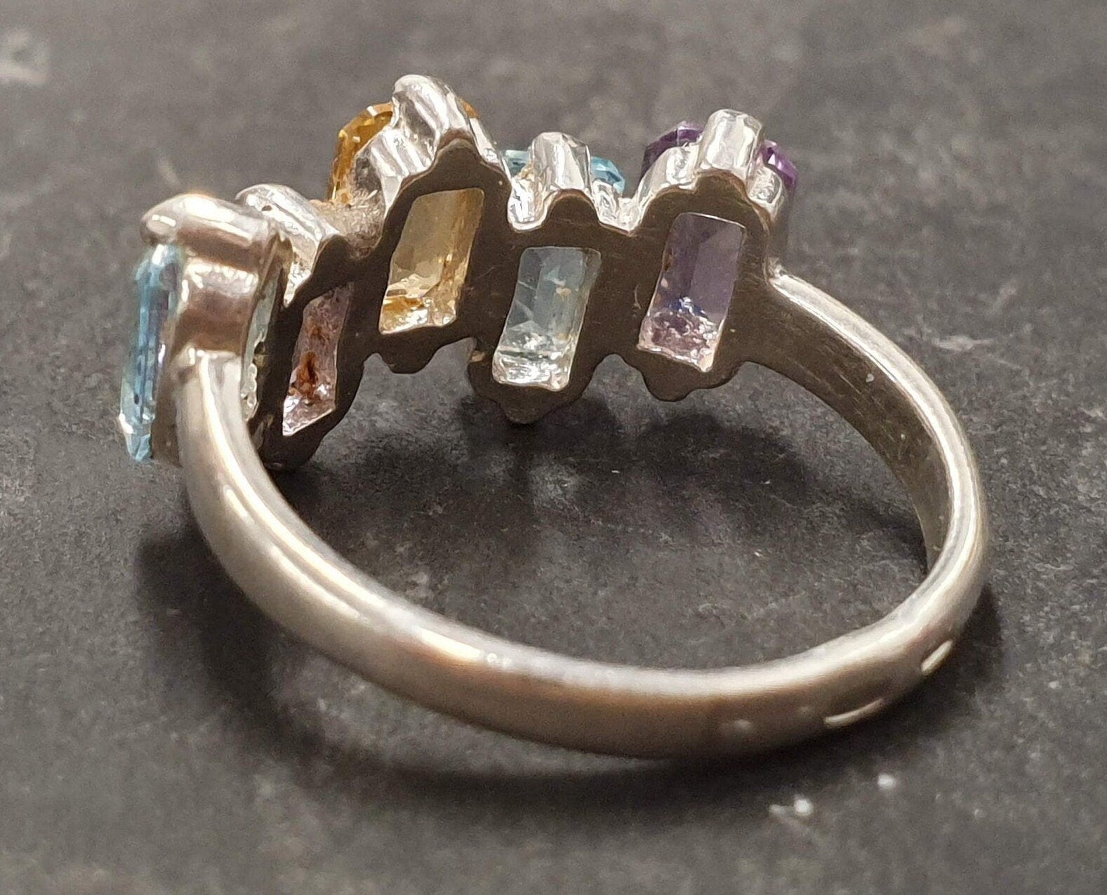Amethyst, Citrine, and Topaz ring featuring radiant color in sleek silver