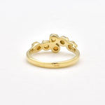 Dainty Opal bypass ring featuring Natural Fire Opals in a gold setting. The bypass design adds elegance and charm while opals are believed to bring hope, inspiration and emotional balance. This makes it a thoughtful October birthstone gift for anniversaries, engagements, weddings and special celebrations.