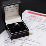 Natural Fire Opal solitaire ring set in 18k solid white gold, a timeless jewelry piece symbolizing creativity and passion, the perfect October birthstone gift for anniversaries, engagements, or milestone celebrations.