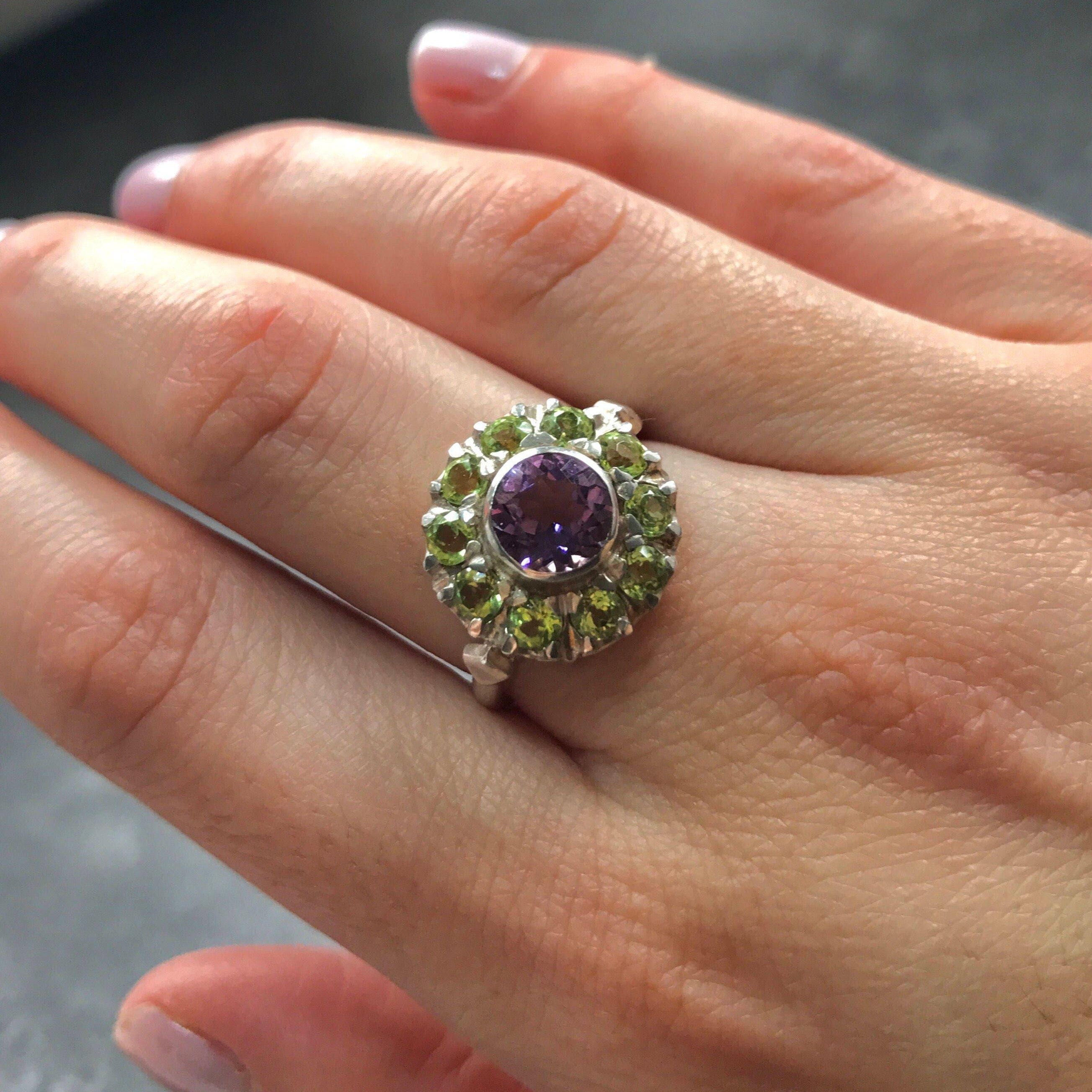 Amethyst and Peridot Ring styled on hand with nude nail polish and soft lighting, ideal for garden events, spring birthdays or feminine daily wear