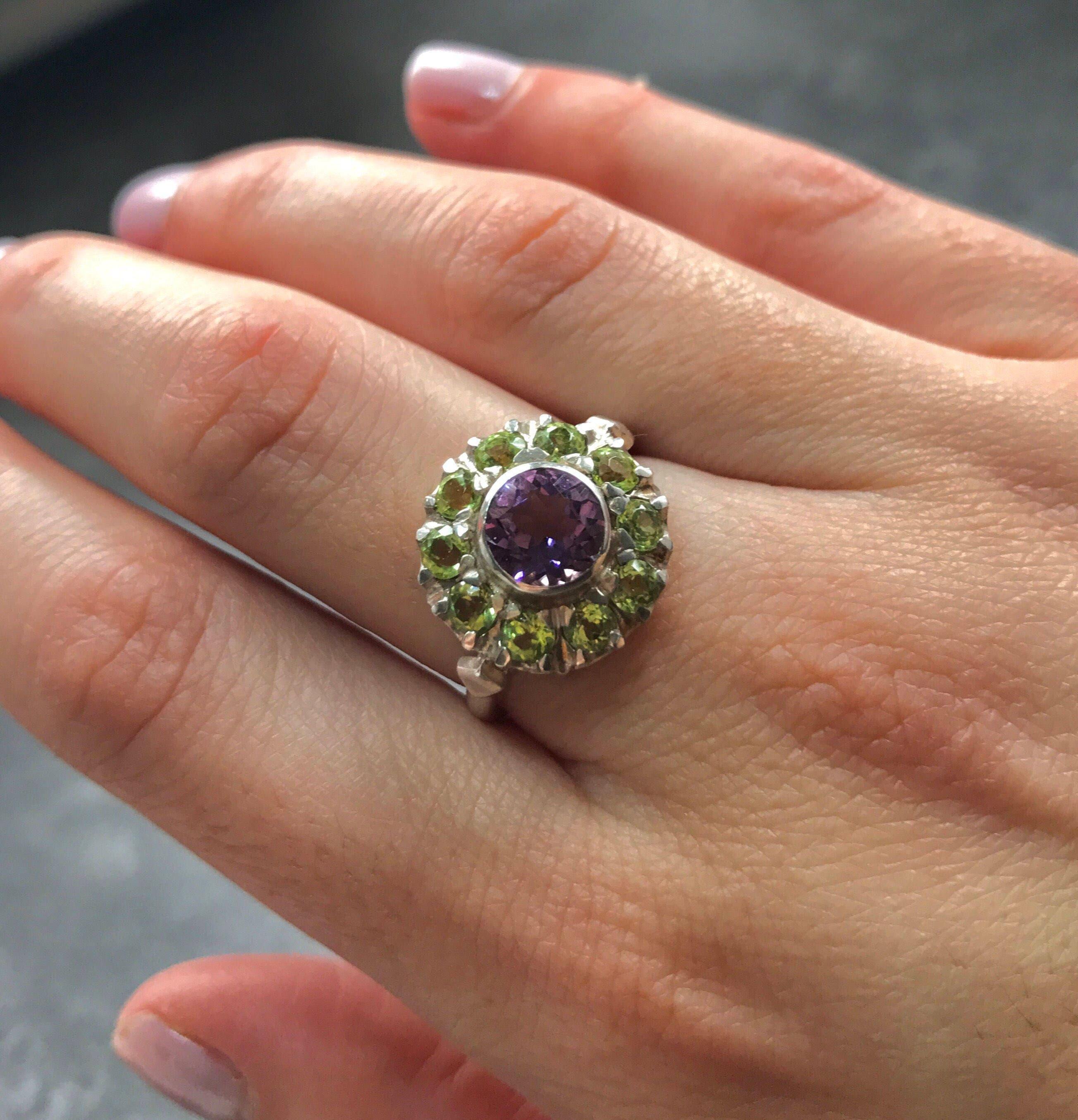 Amethyst and Peridot Ring styled on hand with nude nail polish and soft lighting, ideal for garden events, spring birthdays or feminine daily wear