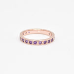 Rose gold amethyst ring with diamond cut purple stones for a vintage look