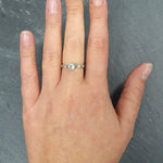 Aquamarine ring with Celtic-inspired design, ideal for cultural events or March birthday girls.