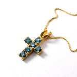 Cross Aquamarine March birthstone necklace set in 18k Yellow Gold Vermeil over Solid 925 Sterling Silver,  in stunning blue color and clarity, and in prong setting. Blue cross pendant perfect for religious events, ang thoughtful personalized gift. Aquamarine gemstone brings tranquility, aids in self-expression, and protects travelers. For courage, communication, and soothing.