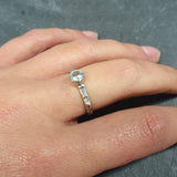 Sparkling diamond-cut Aquamarine ring ideal for dressy occasions or gifting to new moms.