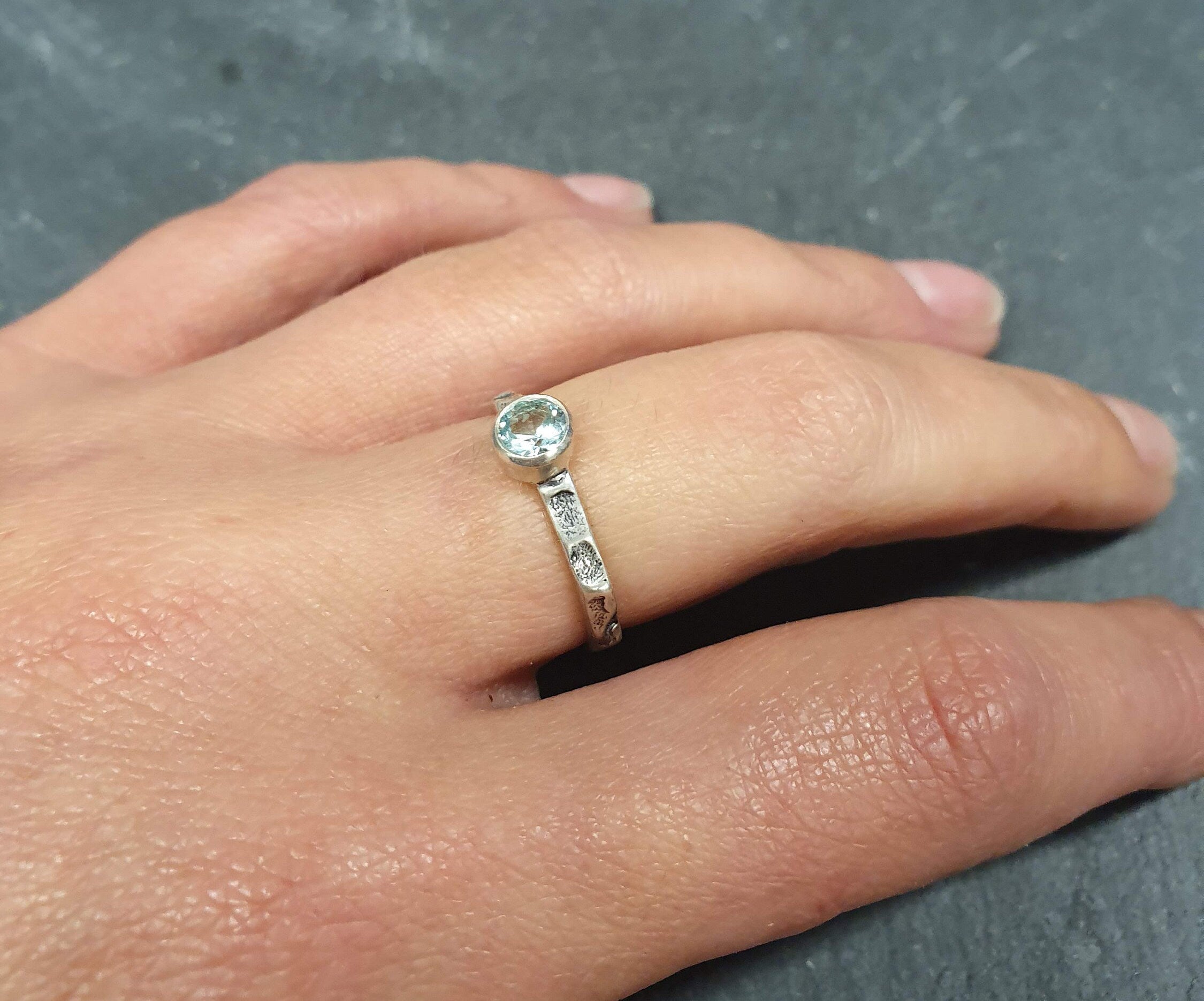 Sparkling diamond-cut Aquamarine ring ideal for dressy occasions or gifting to new moms.