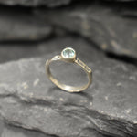 Thin band Aquamarine ring, great for everyday wear and meaningful birthstone gifting.