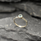 Thin band Aquamarine ring, great for everyday wear and meaningful birthstone gifting.