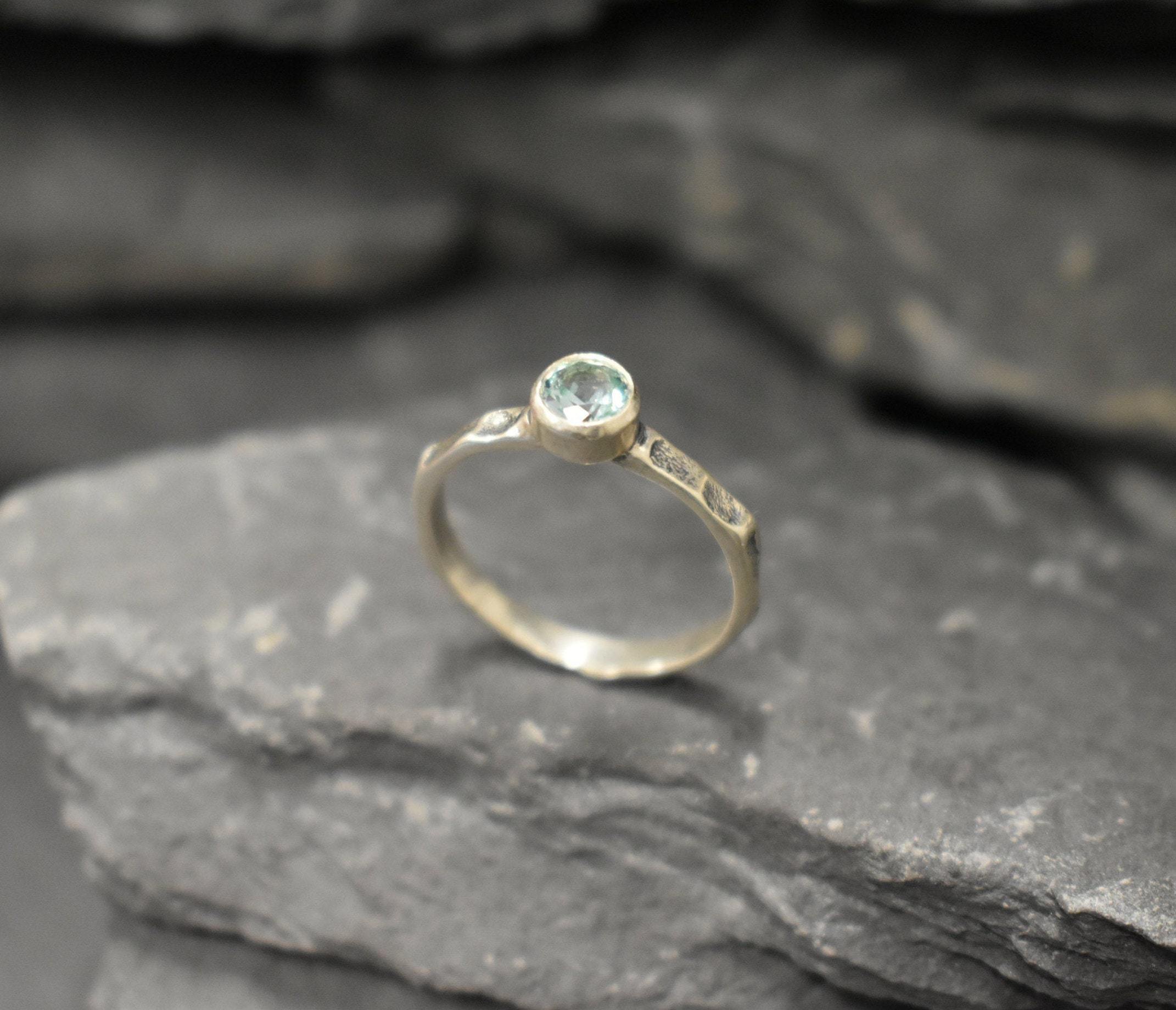 Thin band Aquamarine ring, great for everyday wear and meaningful birthstone gifting.