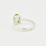August birthstone Peridot ring, timeless oval cut design, perfect for meaningful gifting or self-celebration.