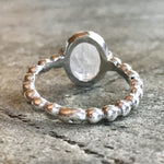 Beaded band Rainbow Moonstone ring in sterling silver adds quiet luxury, helps with inner clarity, fitting for spiritual gifting or quiet moments.