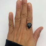 Modern Onyx Ring with silver band pairs with minimalist looks.