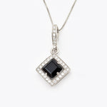 A classic Onyx Pendant Necklace for formal elegance or work attire.