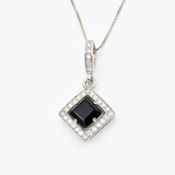 A classic Onyx Pendant Necklace for formal elegance or work attire.