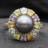 Black Pearl complemented by Amethyst and Citrine gemstones in a sterling silver halo for colorful elegance