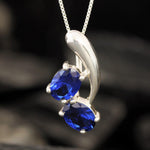 Created Sapphire Pendant made in 925 Sterling Silver with Oval Created Blue Sapphire in Two-Stone setting, September Birthstone gift idea, symbolizes sincerity, truth, and faithfulness, ideal for everyday wear and perfect for birthday gifting and special occasions.