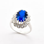 Created Sapphire Ring made in 925 Sterling Silver with Oval Created Blue Sapphire in Halo setting, September Birthstone gift idea, symbolizes sincerity, truth, and faithfulness, ideal for everyday wear and perfect for birthday gifting and special occasions.