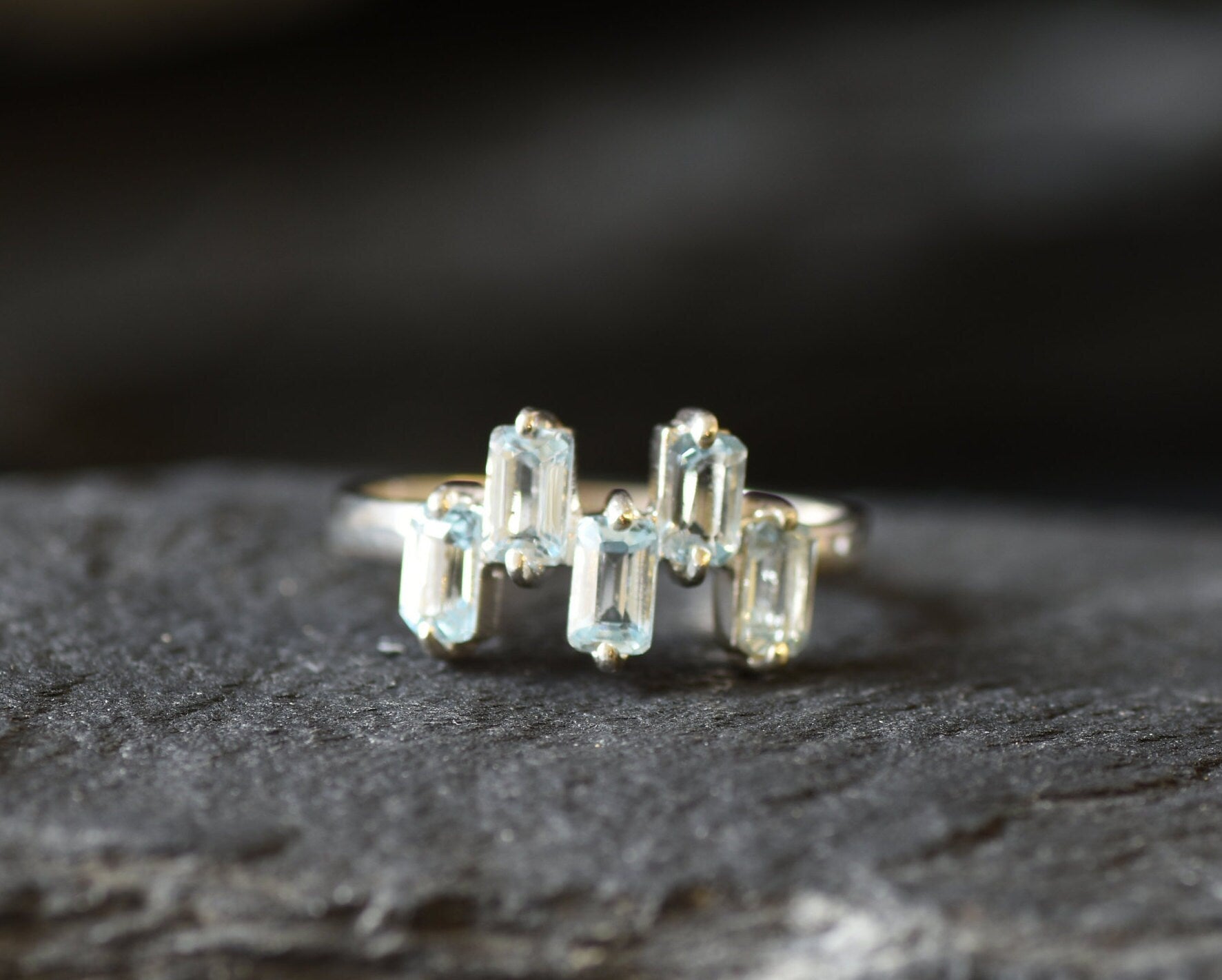 Banded topaz ring fit for minimalist styling or November birthstone occasions.