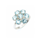 Blue Topaz cluster ring in floral style, perfect for adding sparkle and elegance to everyday wear, great birthday gift for December, ideal for holiday gatherings