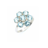 Blue Topaz cluster ring in floral style, perfect for adding sparkle and elegance to everyday wear, great birthday gift for December, ideal for holiday gatherings