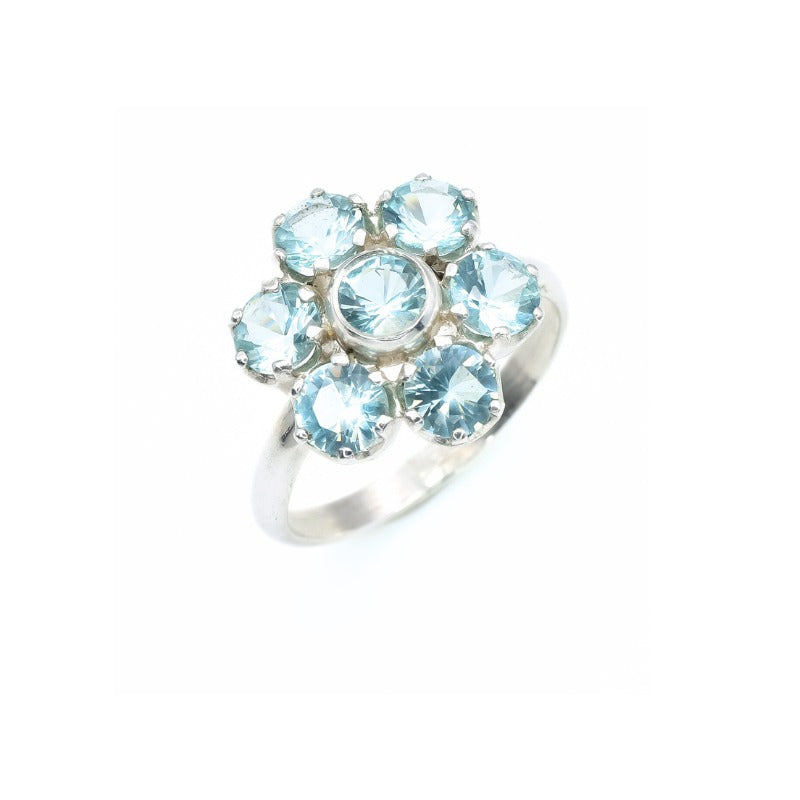 Blue Topaz cluster ring in floral style, perfect for adding sparkle and elegance to everyday wear, great birthday gift for December, ideal for holiday gatherings
