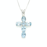 Blue Topaz pendant in silver cross style for modern jewelry lovers
