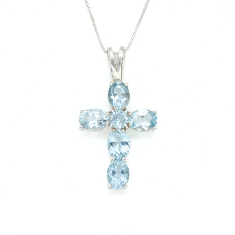 Blue Topaz pendant in silver cross style for modern jewelry lovers