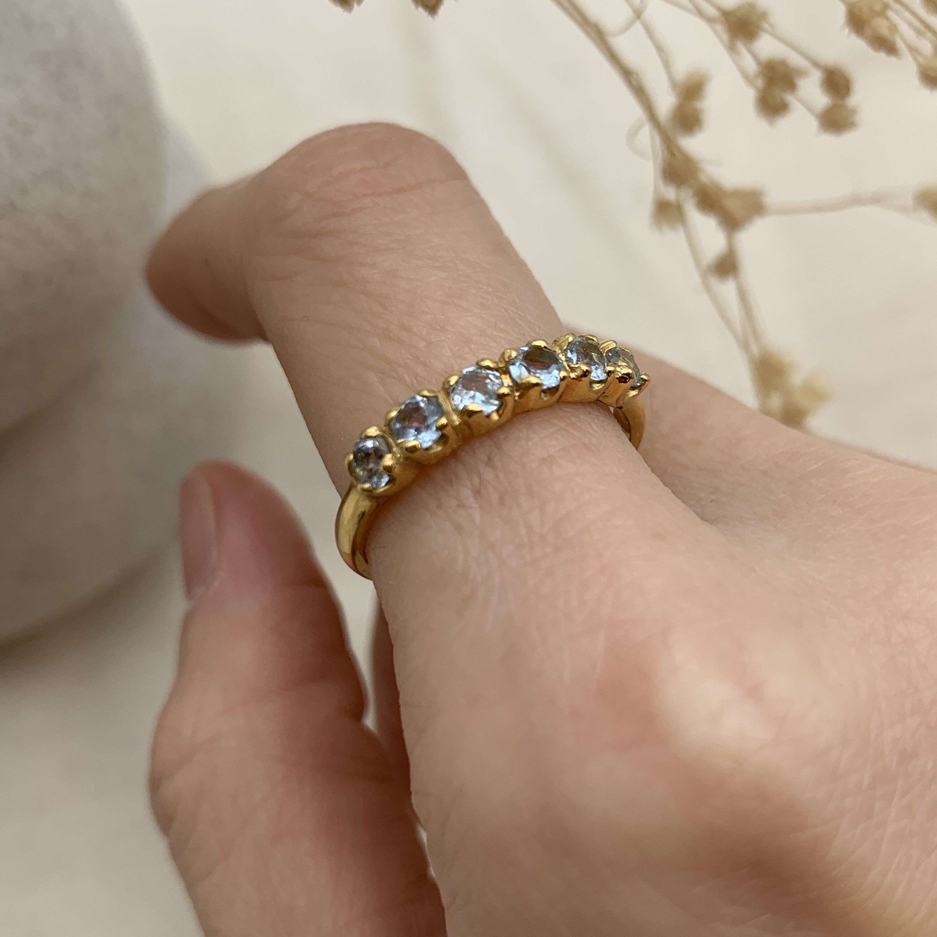 Blue Topaz Gold Ring, Half Eternity Band, Gold Stackable Ring worn on index finger