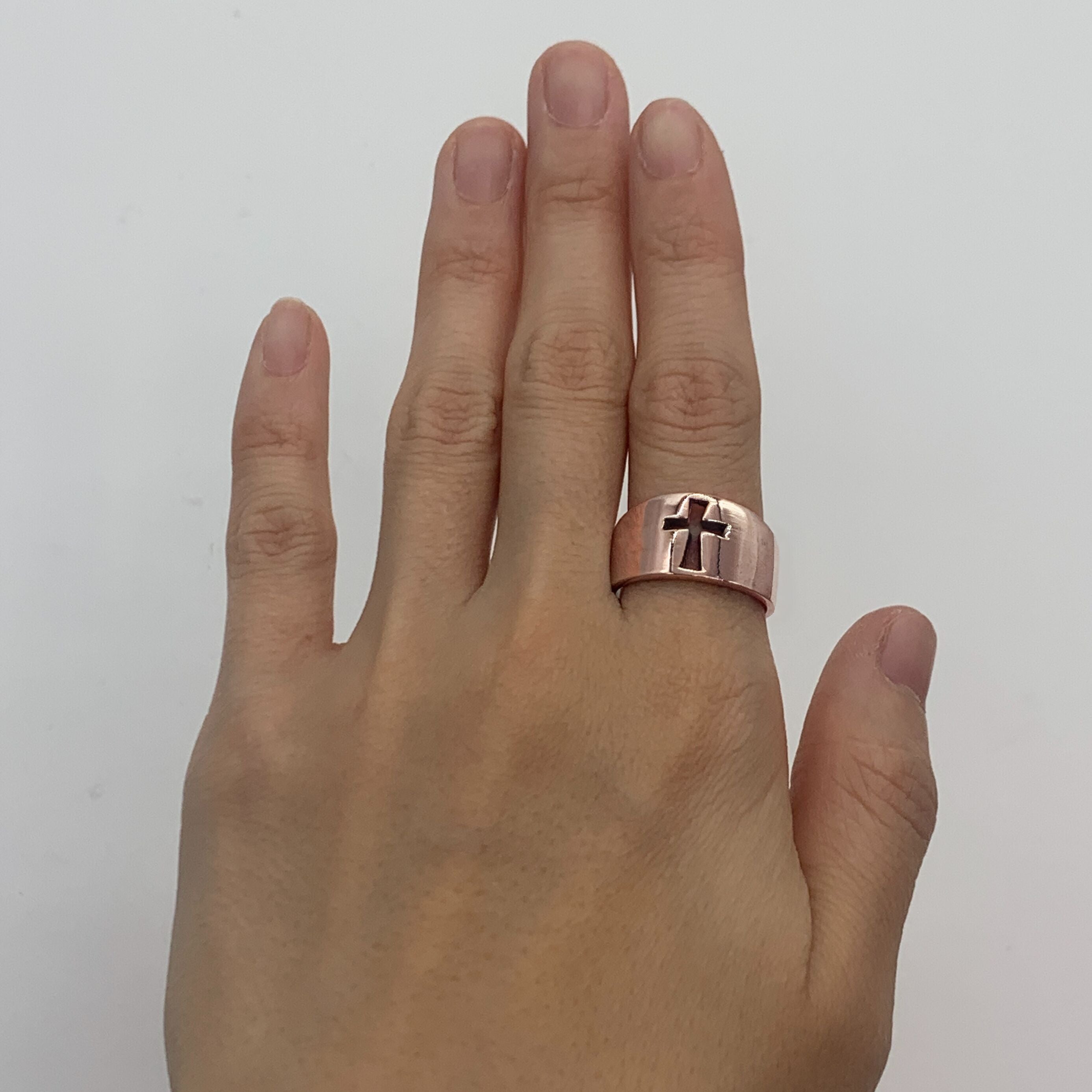 Rose gold plated ring over sterling silver, with cut out cross design. Chunky statement ring, can be worn on index, or ring finger for stacking