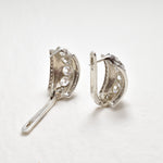 Created Diamonds set in a Solid 925 Sterling Silver huggie earrings